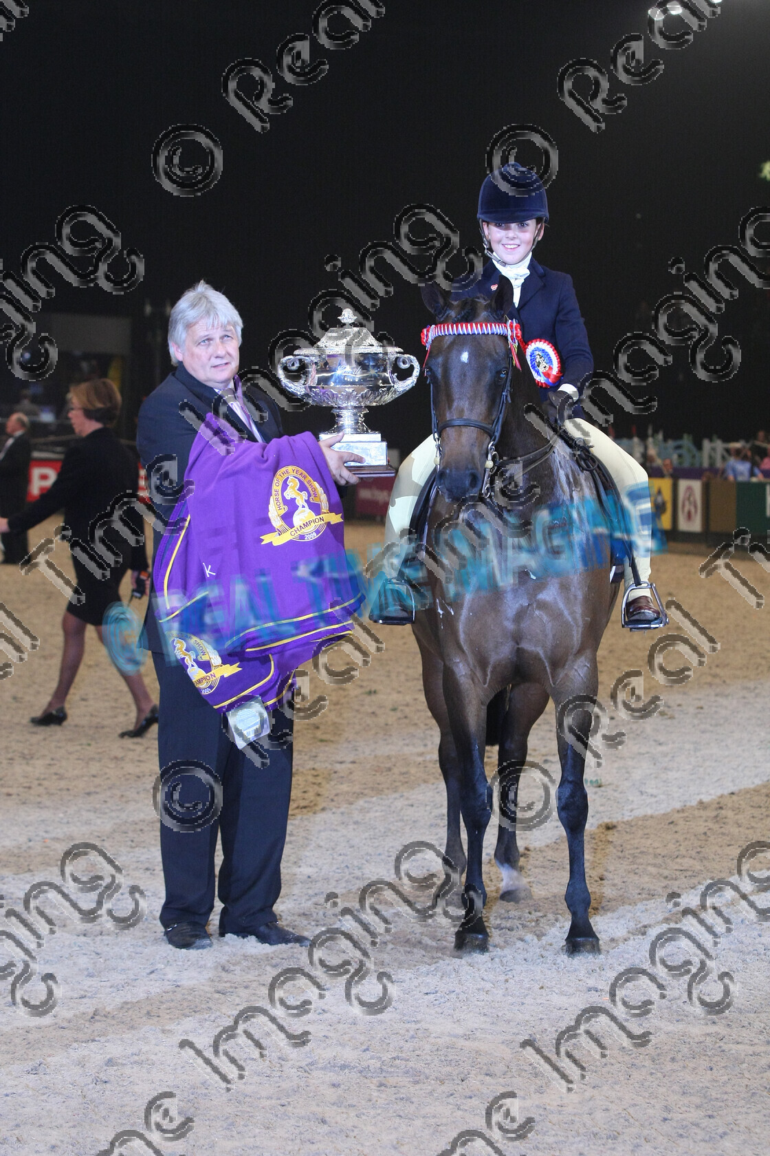 S09-68-13-018 
 Keywords: HOYS Horse Of The Year Show Friday 9 October 2009 NEC LG Arena Birmingham UK indoors 1188 DIPTFORD AMAZING GRACE bay mare 138cm Show Pony Children's Riding Pony Champion Owner: Mrs D L Thomas Rider: Katie Roberts