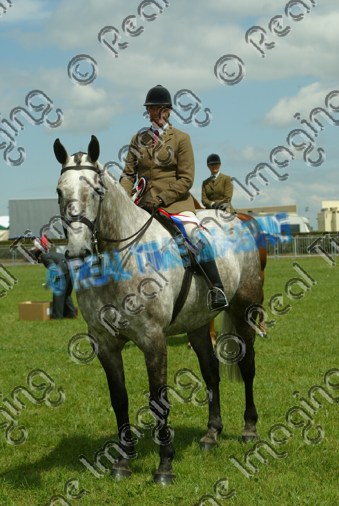 S06-26-T2-001 
 Keywords: Cheshire County Show
Tuesday 20 June 2006
2238 SILVER STREAM
rider Jayne Webber
dappled grey gray
Heavyweight Hunter
horse pony show showing
rosette rosettes prize winner
champion first best
presentation award
standing stood